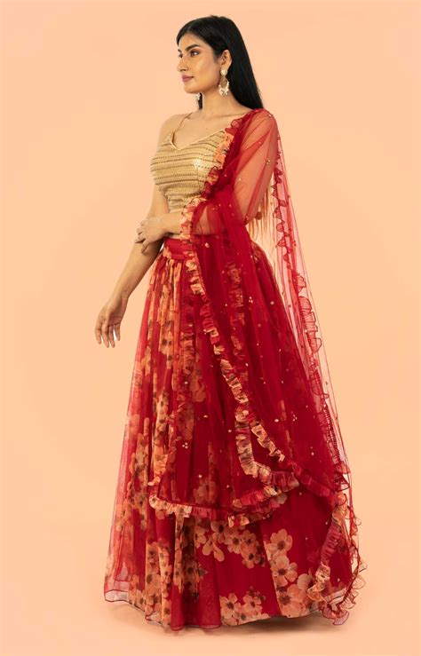 Poppy Red Lehenga In Mustard Floral Motif Print Matched With Golden