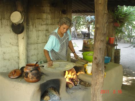 Mexican Woman In Outdoor Kitchen In The Mountains Near Puerto Vallarta