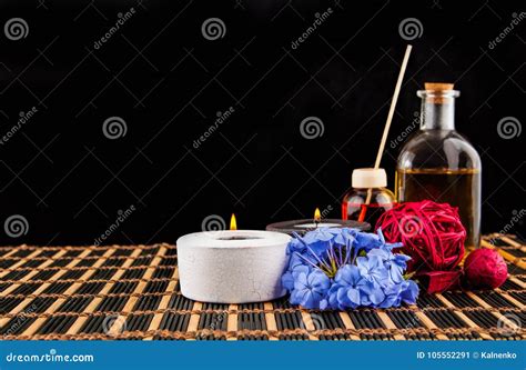 Spa Decoration With Stones Candle With Massage Oil On A Blac Stock Image Image Of Pamper