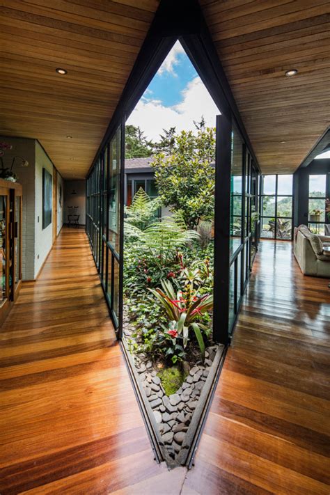 This Triangular Shaped House Makes Room For An Interior Garden