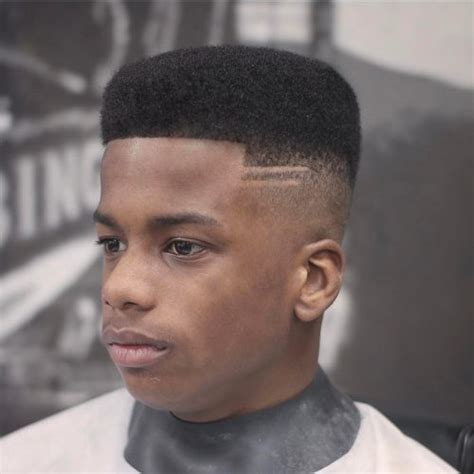 A number 4 haircut is longer leaving a medium length cut of around 1/2 inch. 26 Fresh Hairstyles + Haircuts for Black Men in 2020