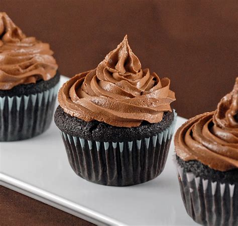 The combination of a rich and moist chocolate butter cake topped with a rich and creamy chocolate butter frosting is irresistible. Ganache Filled Chocolate Cupcakes
