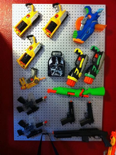 You can paint it, modify it or whatever. Nerf Airsoft Storage Wall - project and picture by Vickie :) | Eric | Pinterest | Boys, Nerf and ...