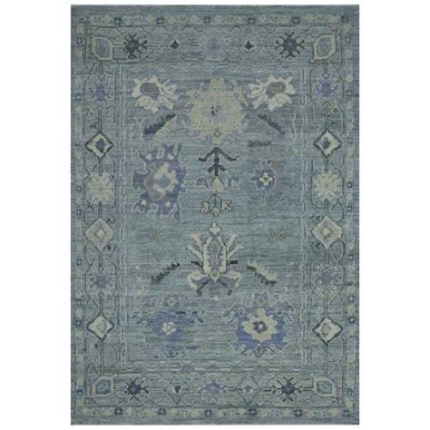Modern Turkish Oushak Rug In Blue With Rust And Brown Floral Details