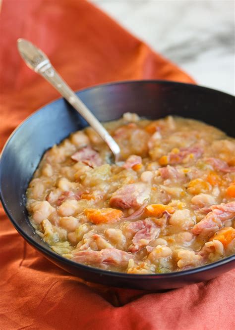Bring to a boil, cover, reduce heat and simmer for 10 to 12 hours. Slow Cooker Ham Bone and Navy Bean Soup - Lisa's ...