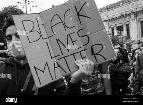 Protester Holding Placard With The Words Black Lives Matter During