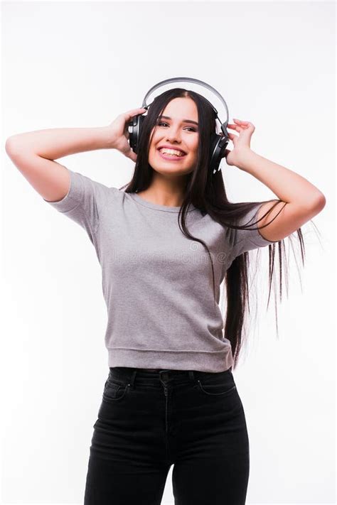 Nice Brunette Girl Listen Dancing To Music With Headphones Stock Photo