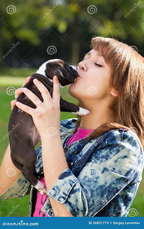 Girl Kissing Her Puppy Stock Image Image Of Animals 26831775