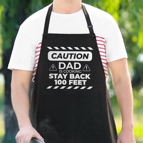 Funny T For Dad Caution Dad Is Cooking Apron For Fathers Etsy In 2020 Funny Aprons For