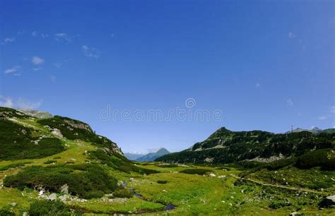 Wide View Into A Mountain Valley With Wonderful Green Nature Panorama