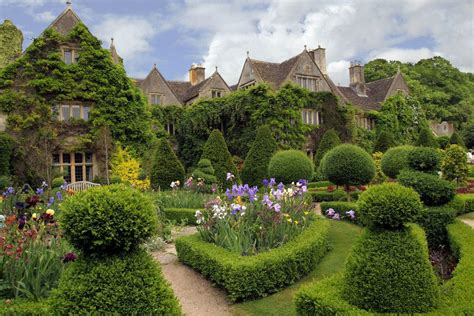 The Lush Gardens Of The Cottages Of The Cotswolds Just Outside Of