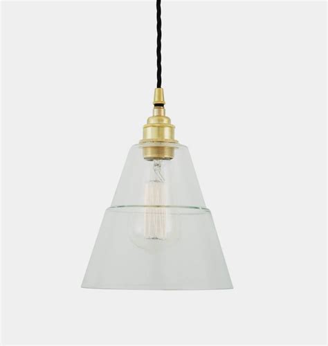 description with a sleek and contemporary design the lyx clear glass pendant light adds an
