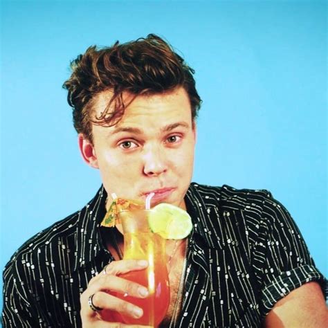 his cough was so cute in this video he is the cutest taking a drink 5sos ashton ashton irwin