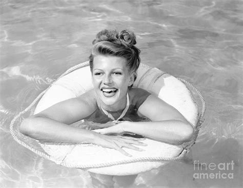 Rita Hayworth Posing In Swimming Pool Photograph By Bettmann Fine Art America