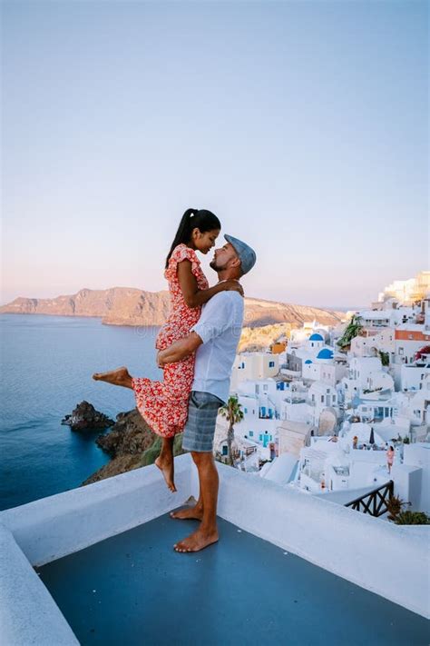 Santorini Greece Young Couple On Luxury Vacation At The Island Of
