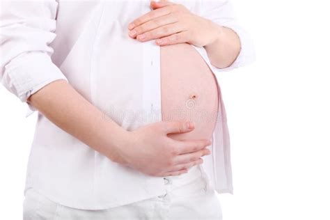 Hands And Belly Of Pregnant Woman Touching Her Belly Stock Image