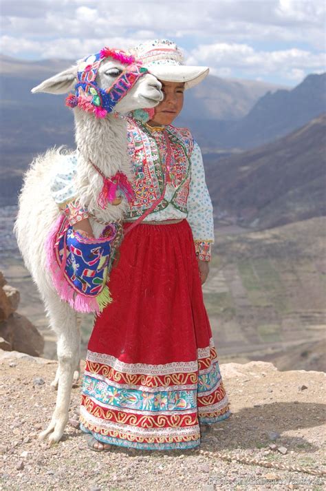 Little Cabanas Girl Near The Colca Canyon In Traditional Embroidered