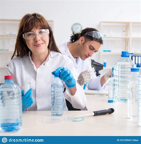 Two Chemists Working In The Lab Stock Image Image Of Control