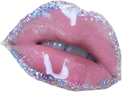 a close up of a person s mouth with glitter on it