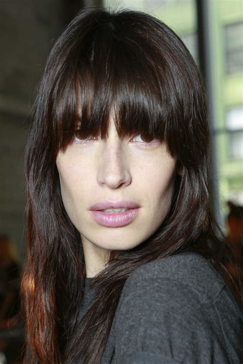 Approach the fringe area from underneath and allow the hair to drop into the wide teeth of the comb. Fringe Bangs: How to Create the Perfect Bang Hairstyle for You