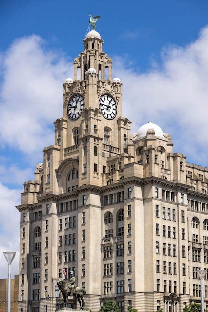 Premium Photo The Royal Liver Building With A Clock Tower In