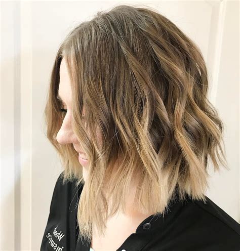 20 Photos Inverted Brunette Bob Hairstyles With Feathered Highlights