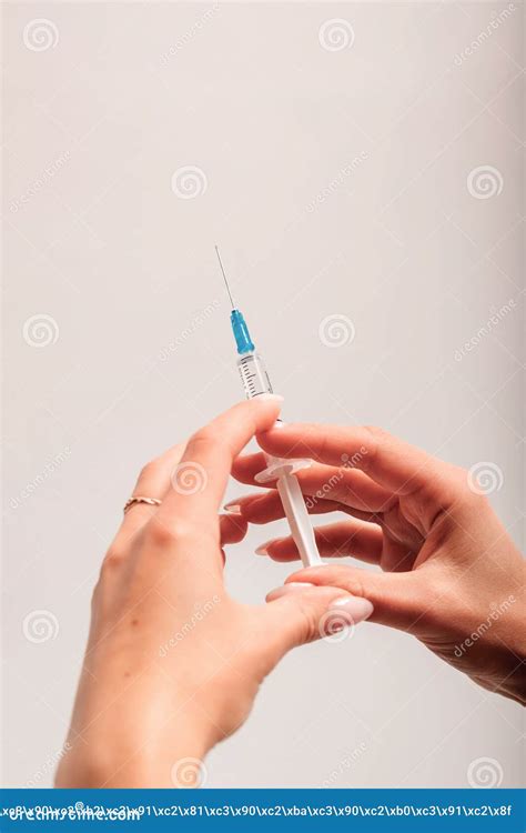 The Doctor Holds A Syringe With An Injection In His Hands Stock Image Image Of Fluid Bright
