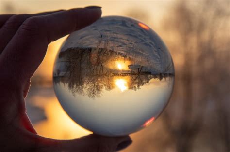 Premium Photo Close Up Of Hand Holding Crystal Ball