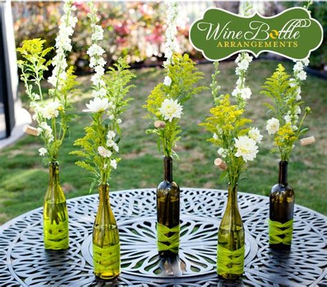 Simple Diy Flower In Wine Bottle Centerpieces A Wedding Blog