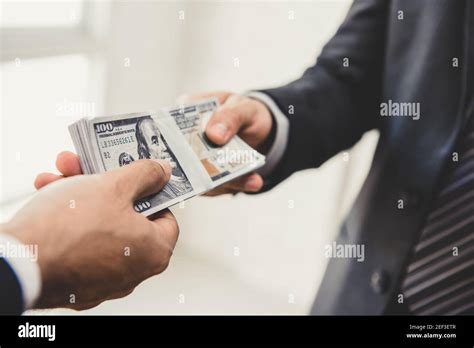Businessman Giving Money Us Dollar Bills To His Partner Loan