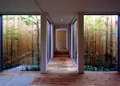 Traditional chinese house, with inner. Minimalist Wooden house with a courtyard in the middle of ...