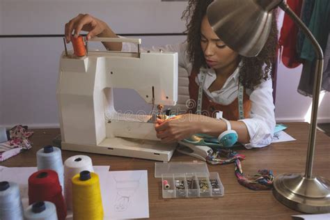 Female Fashion Designer Working With Sewing Machine Stock Image Image