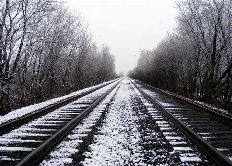Snowy Train Tracks Photograph By Cassie Schook