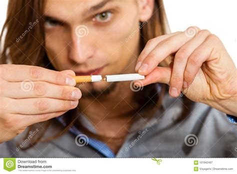 Young Man Is Breaking A Cigarette Stock Image Image Of Smoker