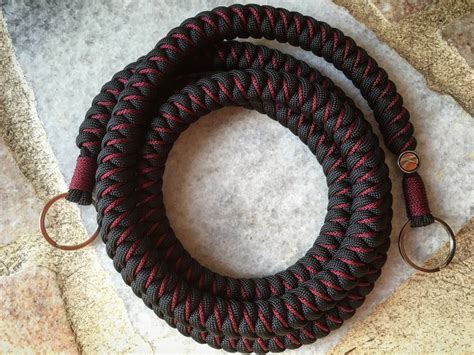 Made from durable 550 type iii paracord. Stitched Snake Knot Camera Strap | Diy camera strap, Paracord camera strap, Snake knot