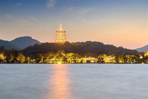 Premium Photo The Pagoda Of Light Is On West Lake China Hangzhou