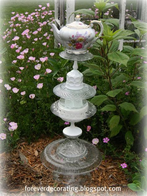 Look for black friday sales on most of the glass flowers! Forever Decorating!: Garden Art Totem