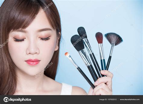 Beauty Woman With Makeup Brushes Stock Photo By ©ryanking999 157932512