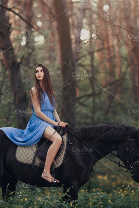 Beautiful Woman Riding Horse In