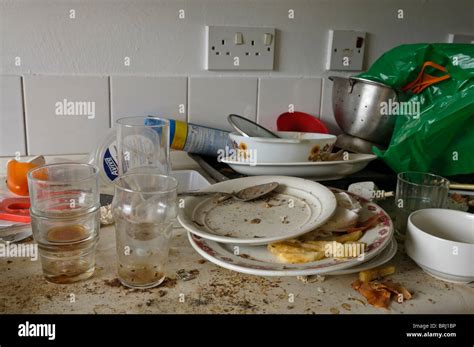 Very Dirty Dishes On A Dirty Kitchen Worktop Stock Photo Alamy