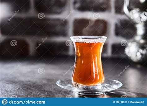 Traditional Azerbaijani Or Turkish Aromatic Tea In An Armudu Cup Stock
