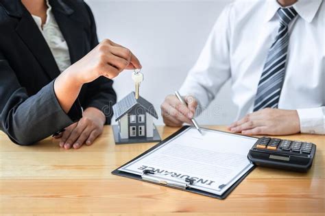 Investor properties insurance is in service of all property investors, giving them a peace of mind habitational property insurance. Home Insurance And Real Estate Investment Concept, Sale Agent Giving House Key To New Client ...