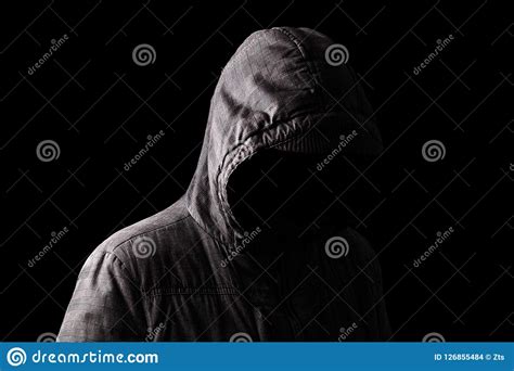 Scary And Creepy Man Hiding In The Shadows With The Face And Identity