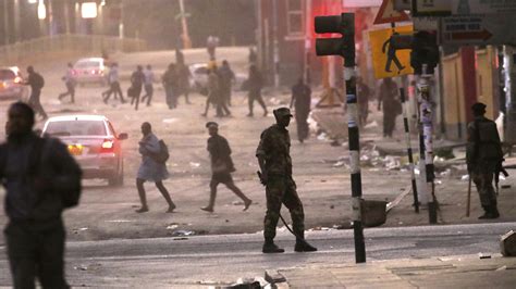 zimbabwe s president calls for peace amid riots linked to election bt
