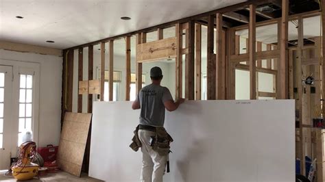 The sheets of drywall on the ceiling are mounted perpendicular to the direction of the the challenge with hanging ceilings, is moving the drywall into place. How to hang drywall by yourself. - YouTube