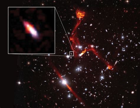 Gravity Of Giant Cluster Magnifies Light And Radio Waves From Distant