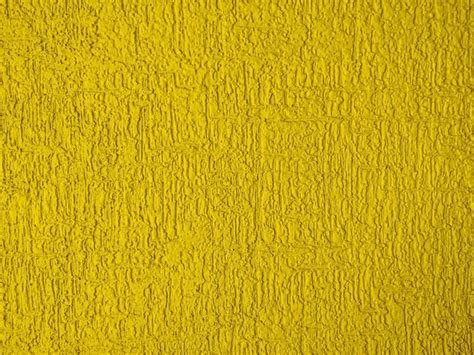 Premium Photo Abstract Rough Wall Texture Plaster Yellow Gold Color