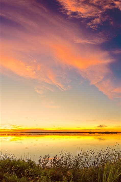 Wallpaper Lake Grass Evening Sunset Sky Clouds 7680x4320 Uhd 8k