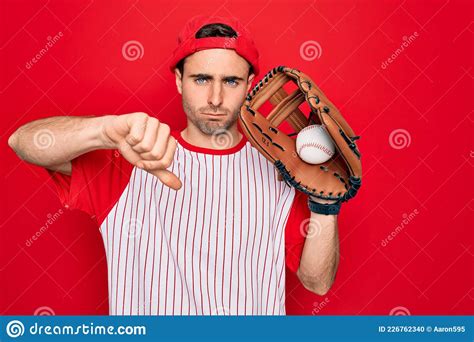 Young Handsome Sporty Man With Blue Eyes Playing Baseball Using Glove