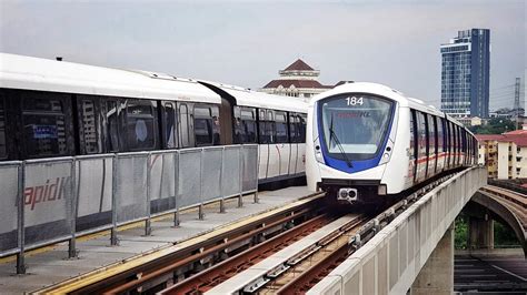 Kelana jaya lrt stantsiyasi a engil temir yo'l stantsiyani kelana jaya chizig'i.  LRT Kelana Jaya  KLAV 84 deploying from Depot Lembah ...